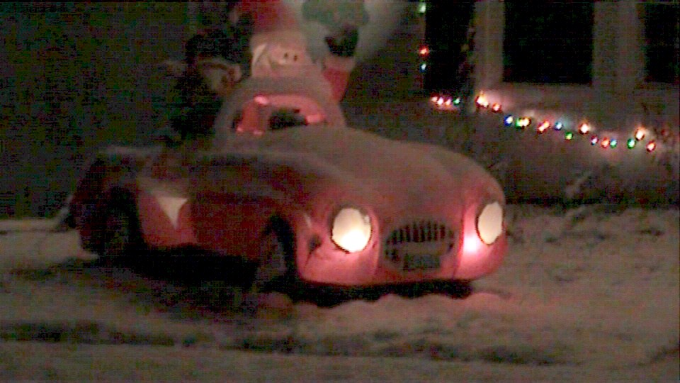 Santa waving in car